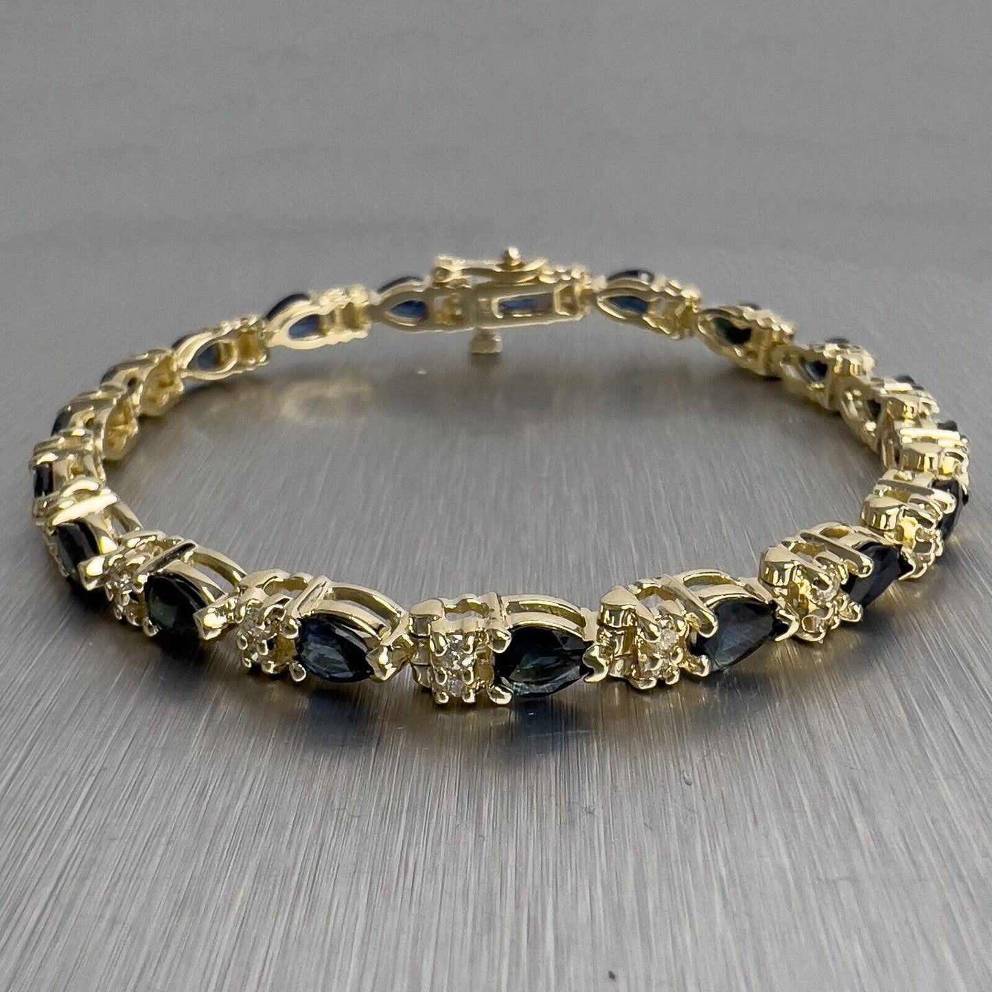 14k Yellow Gold 3.80ctw Pear Sapphire & 0.45ctw Diamond Tennis Bracelet 7"